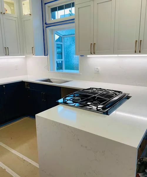 Countertops with full high backsplashes and one waterfall leg in Mukilteo 